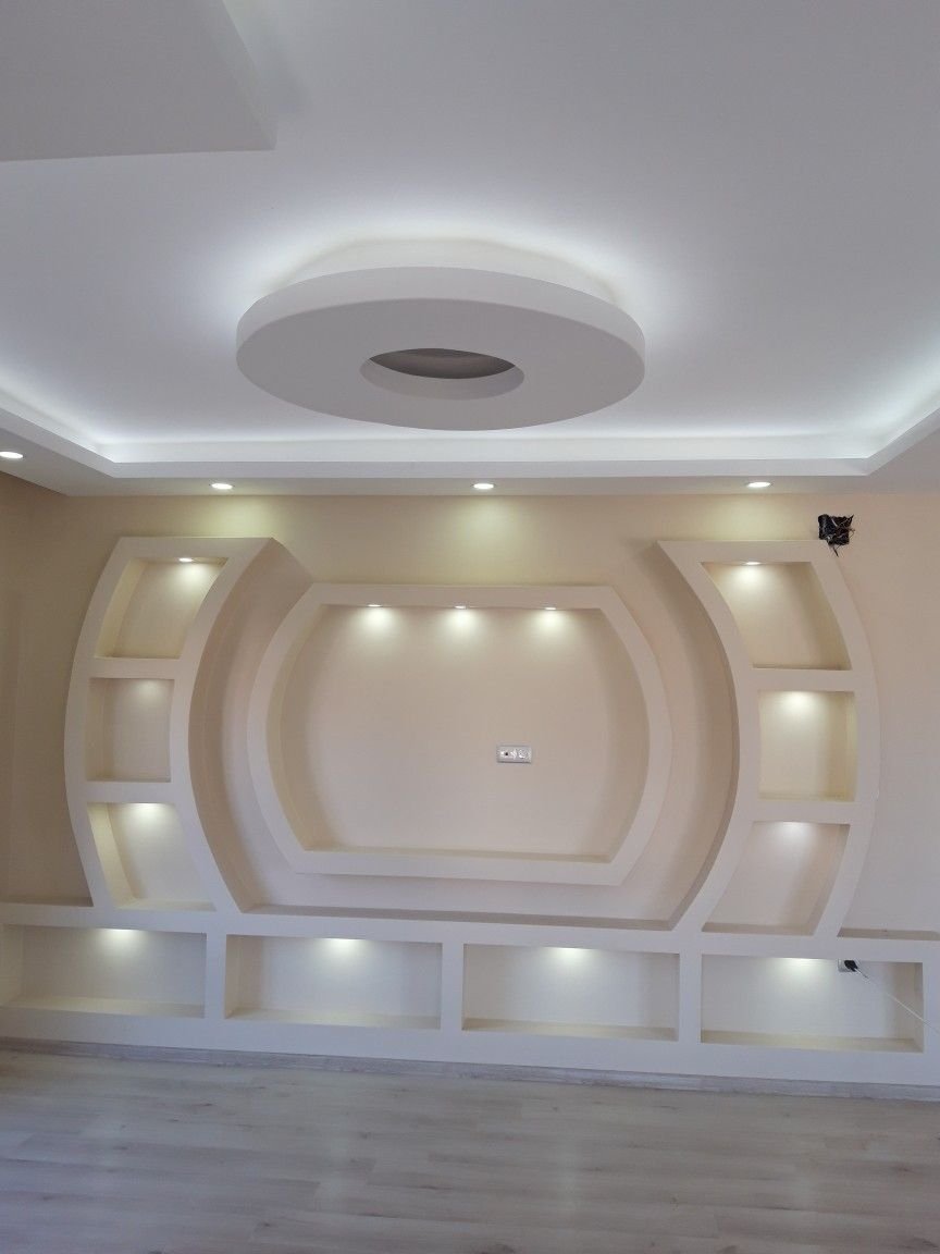 Gypsum TV wall design by Pro Home Decor in Cameroon