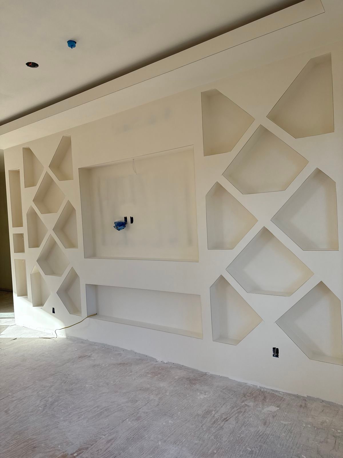 Gypsum TV wall design by Pro Home Decor in Cameroon