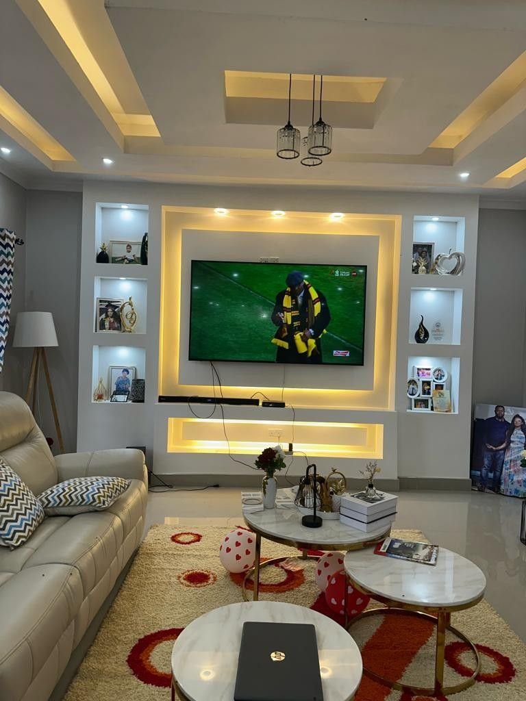 Gypsum TV wall design by Pro Home Decor in Cameroon