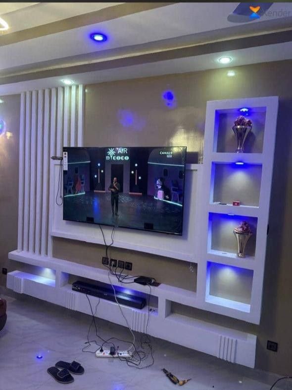 Gypsum TV wall design by Pro Home Decor in Cameroon